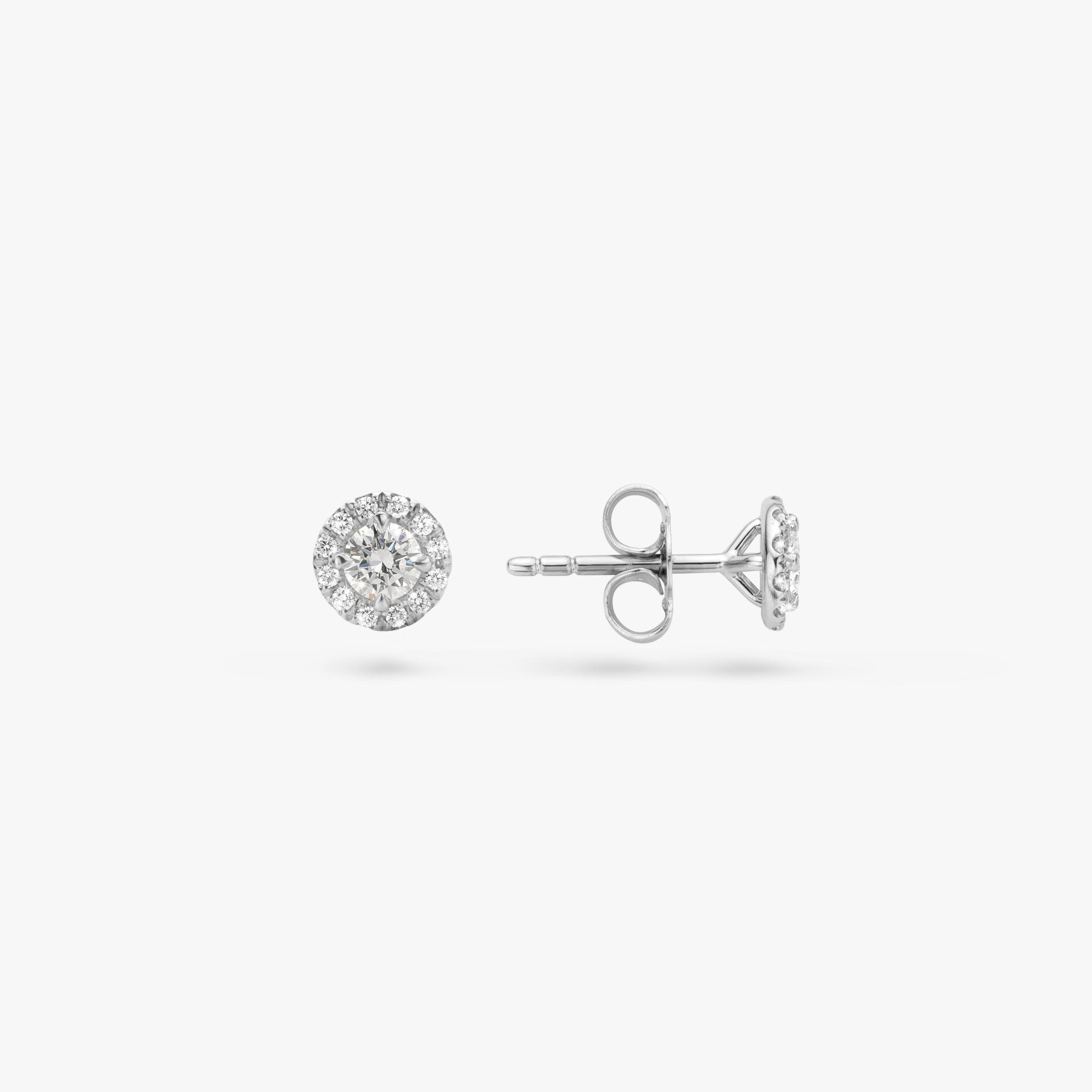 White gold earrings set with brilliant cut diamonds made by Maison De Greef
