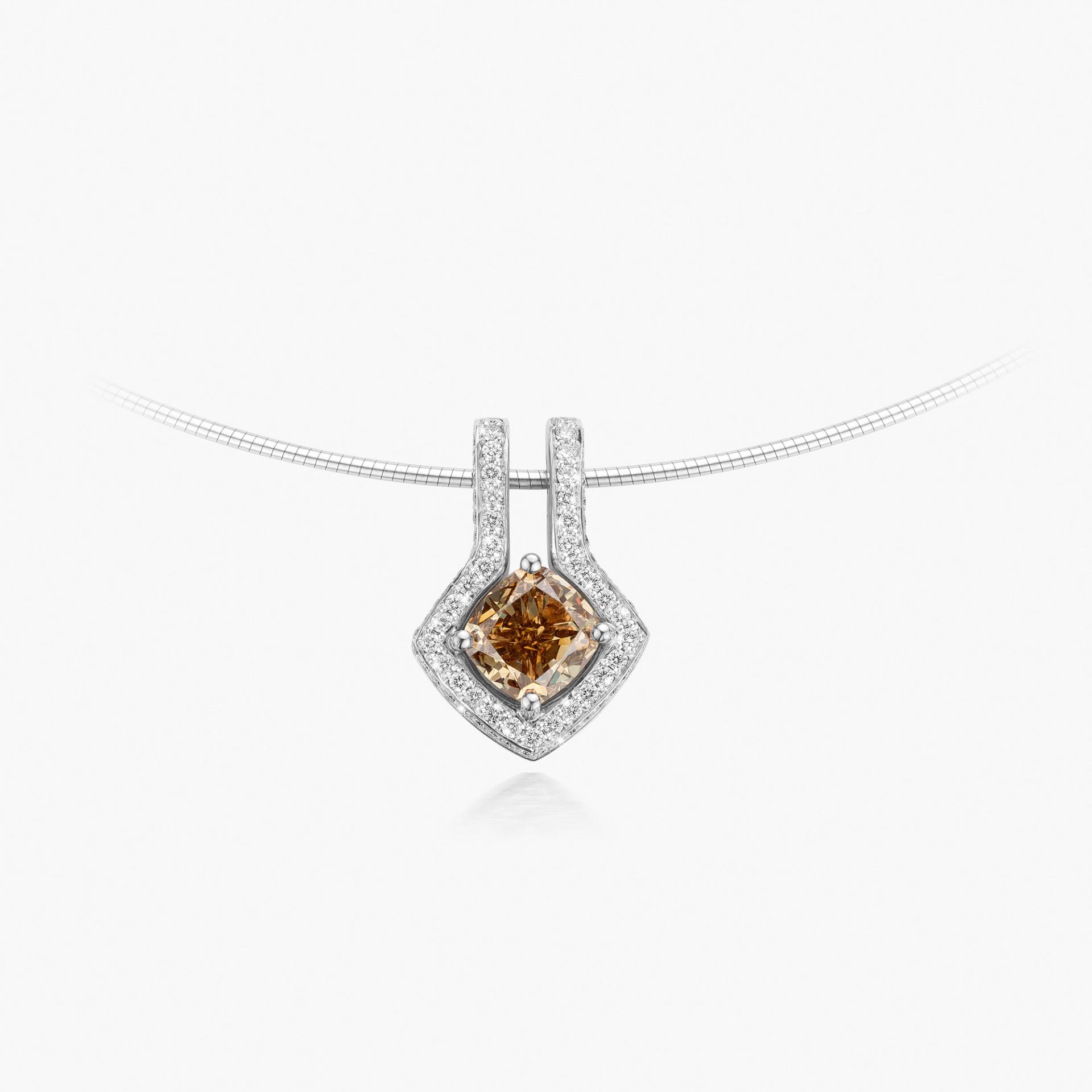 White gold pendant set with a cushion cut diamond Fancy Brown and brilliant cut diamonds made by Maison De Greef