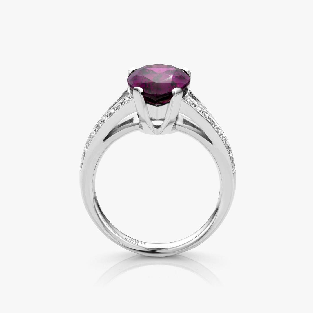 White gold ring set with purple garnet en diamonds made by Maison De Greef