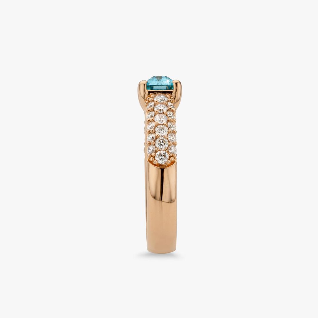 White gold ring set with blue zircon and diamonds made by Maison De Greef