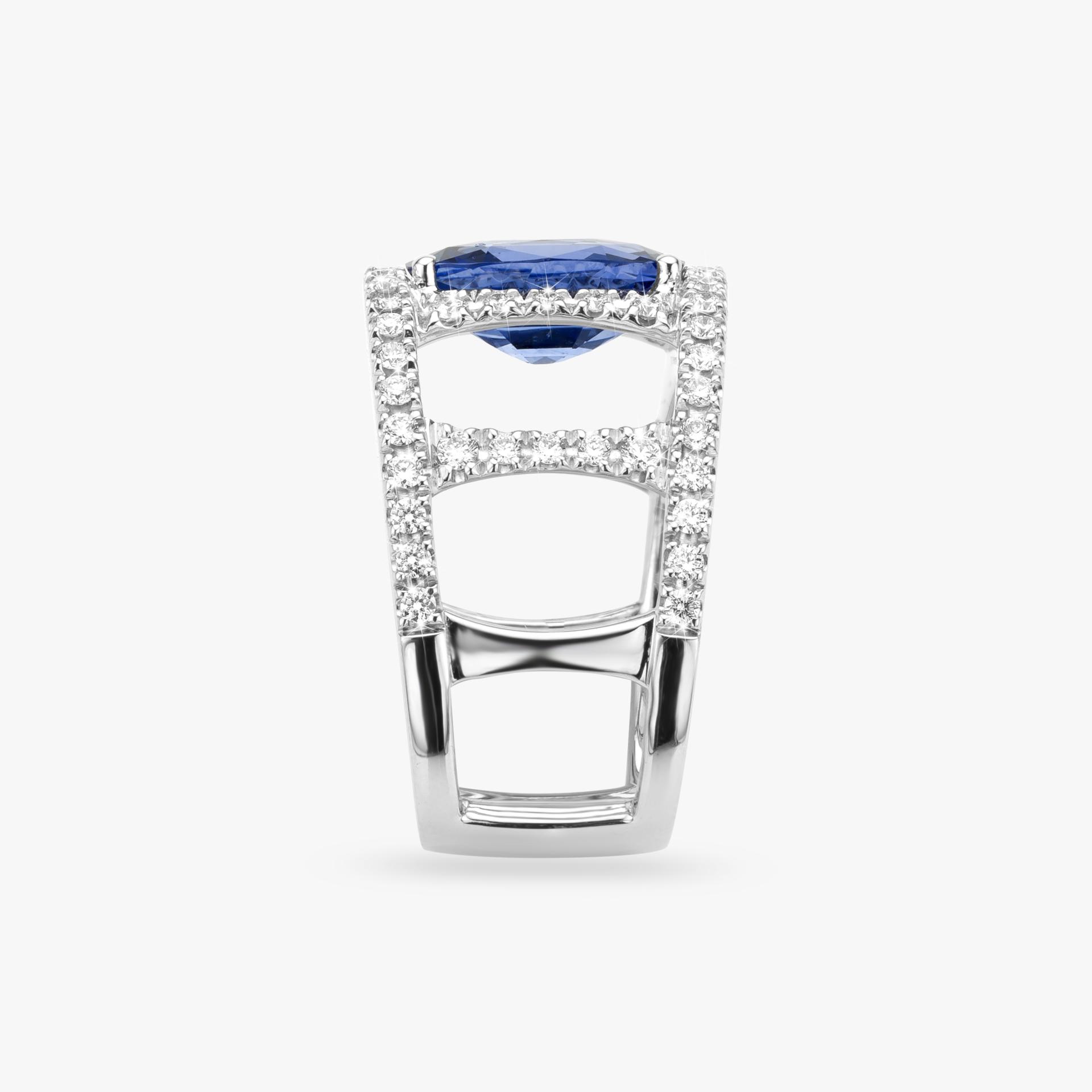 White gold ring set with a blue Ceylon sapphire and brilliant cut diamonds made by Maison De Greef