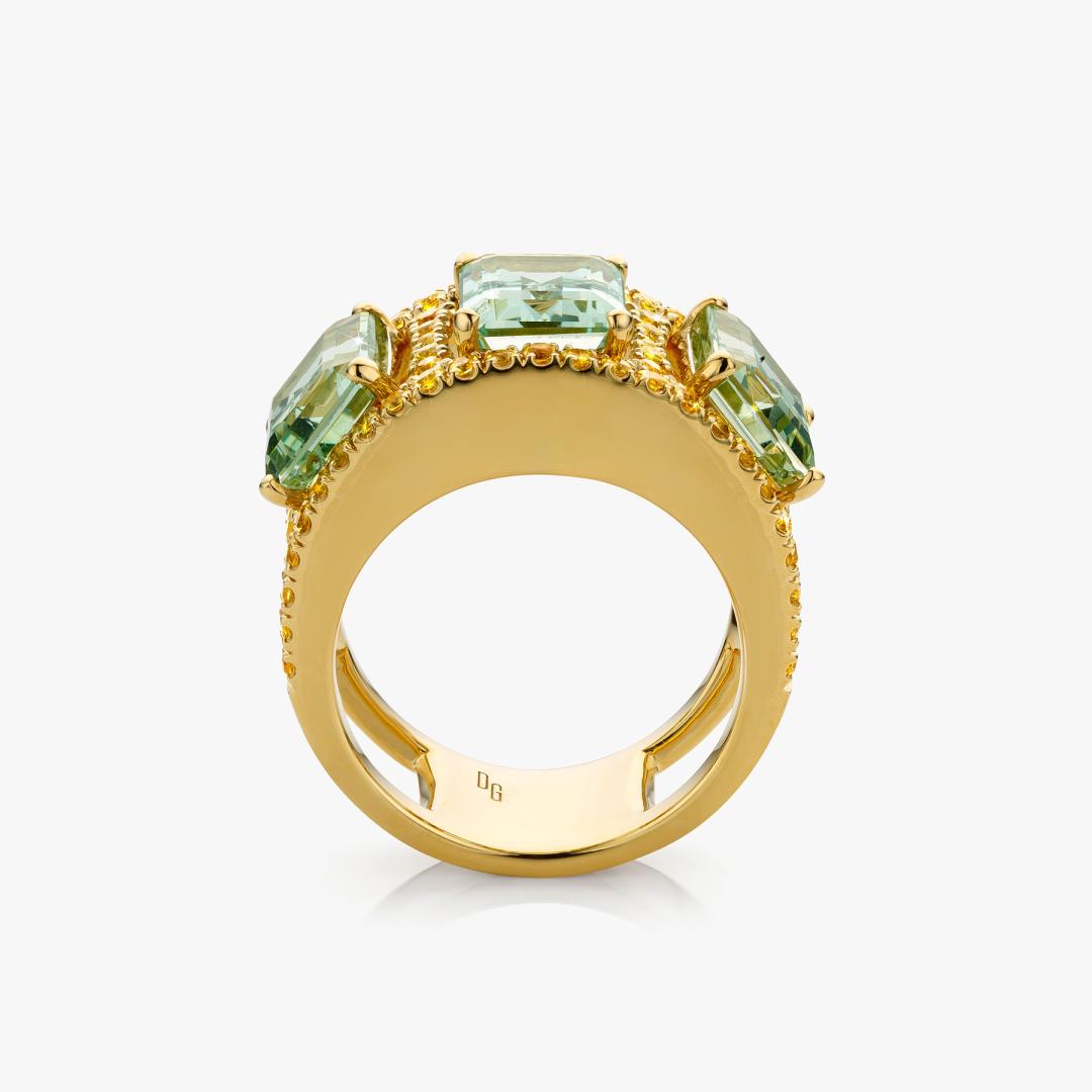 Yellow gold ring set with green tourmaline and and brilliant cut yellow diamonds made by Maison De Greef
