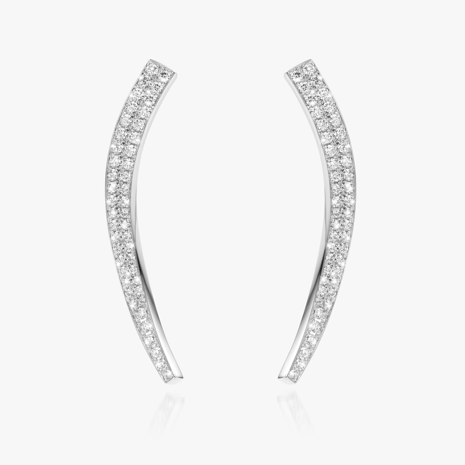 Assymetrical white and rose gold earrings set with brilliant cut diamonds made by Maison De Greef