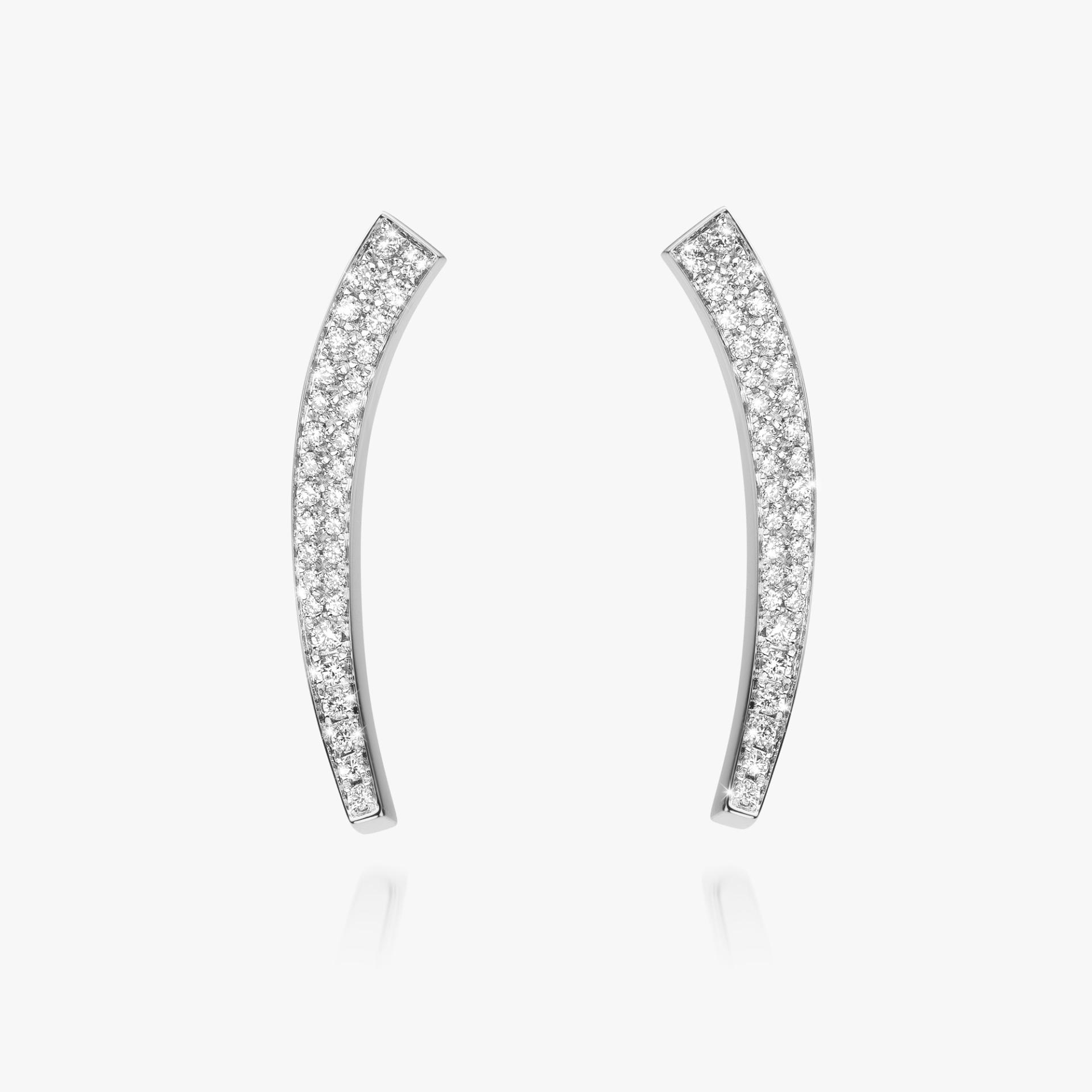 White gold earrings set with diamonds made by Maison De Greef