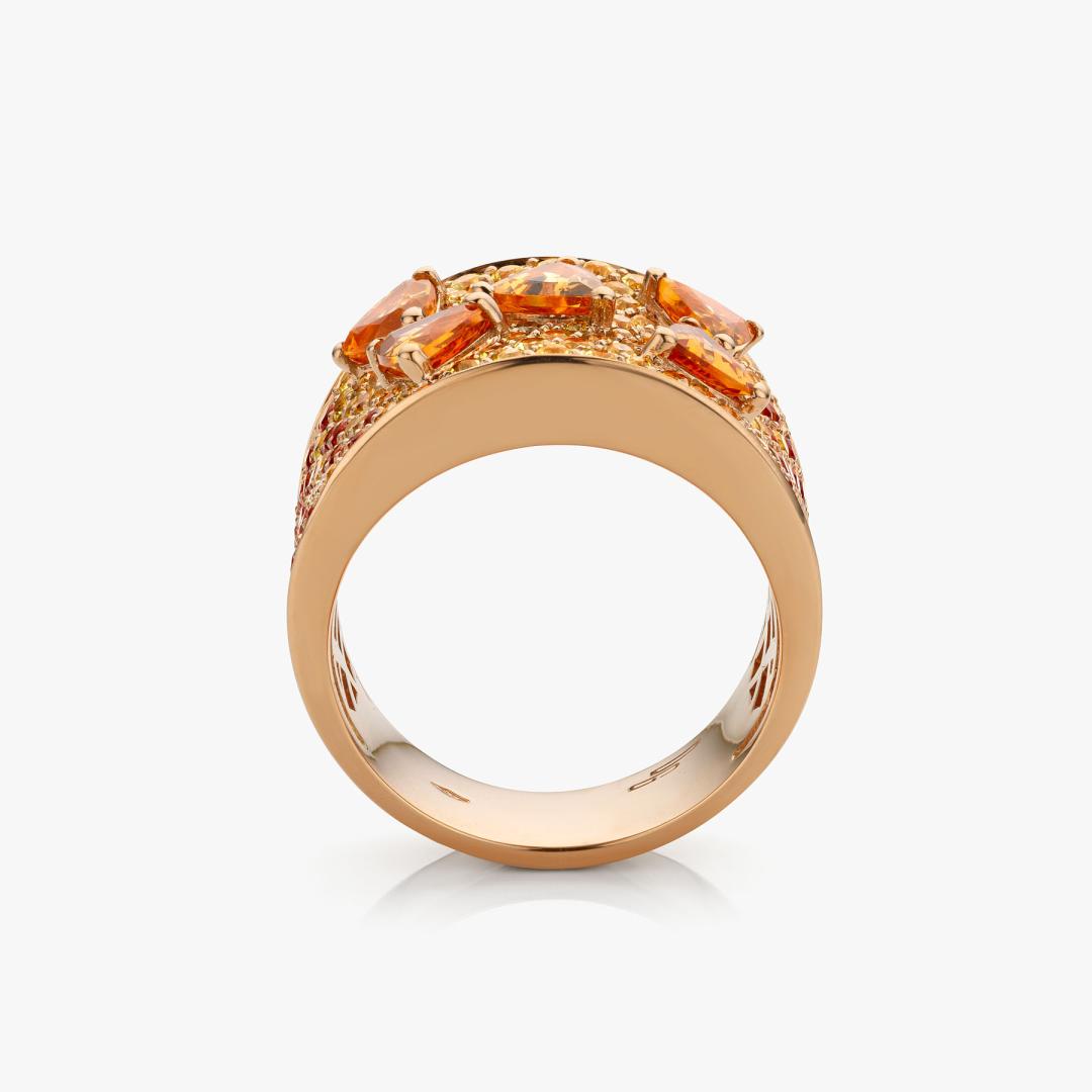 Rose gold ring set with orange tourmalines, yellow and red diamonds made by Maison De Greef